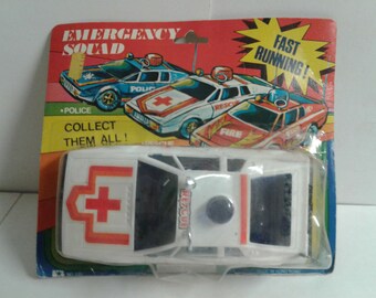 Coche de juguete de plástico de rescate de la brigada de emergencias, vintage de los años 70