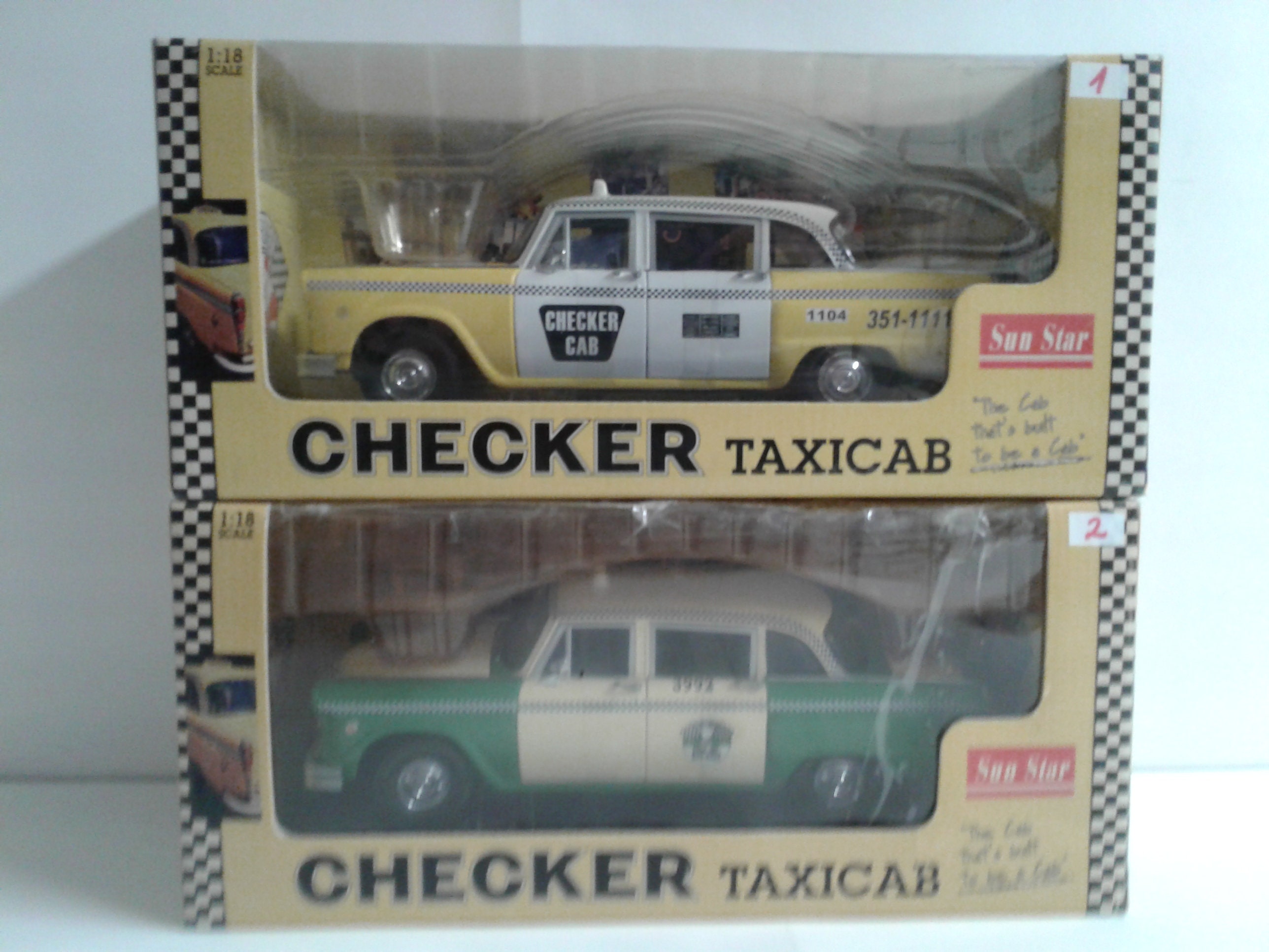 ティガ。1/18　Checker  Taxicab New York City SUN STAR 1981 CHECKER TAXI CAB 1:18 SCALE New