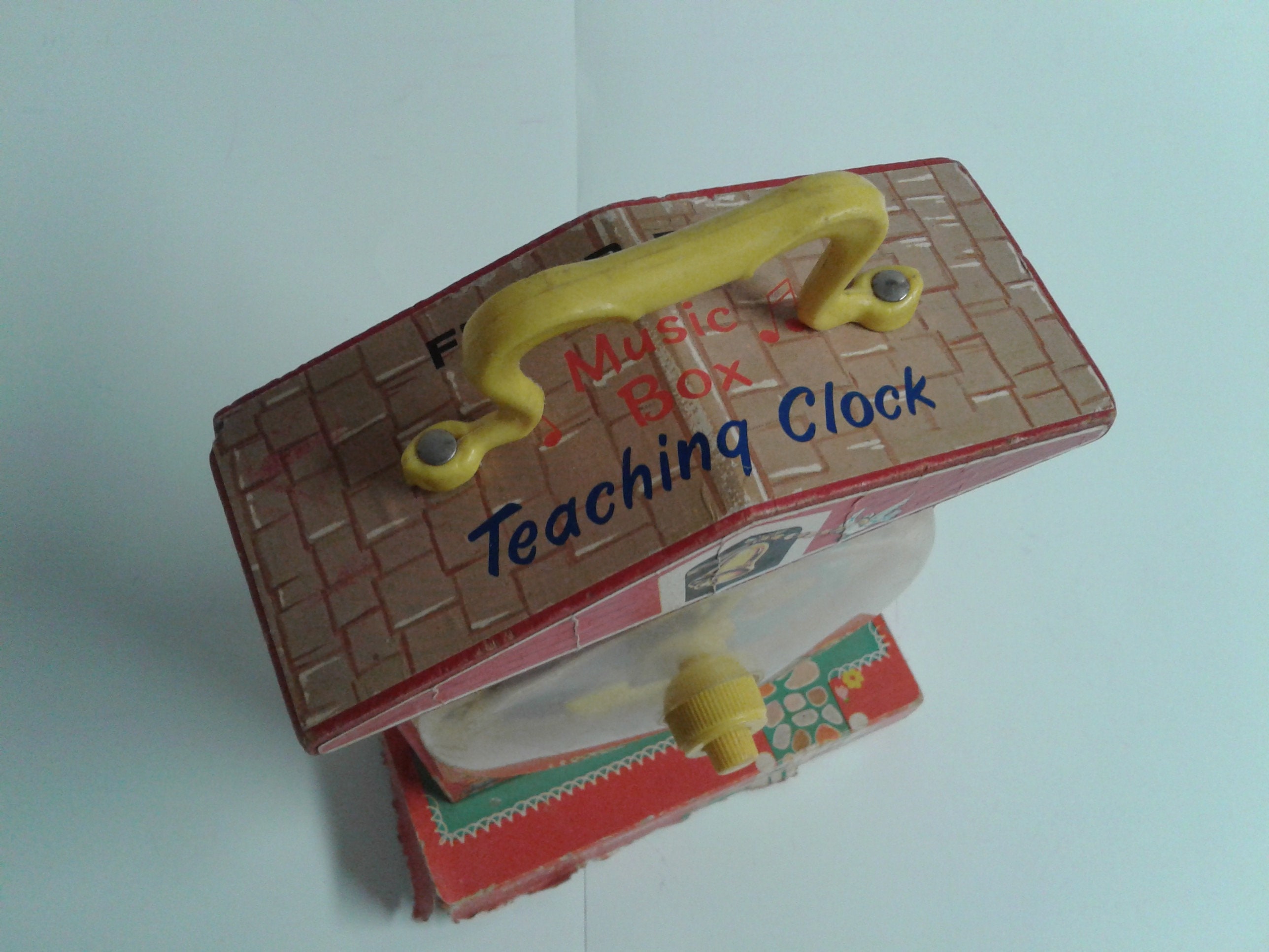 Jouet éducatif Fisher-Price Horloge Musicale Réf 998 Japan - Années 60