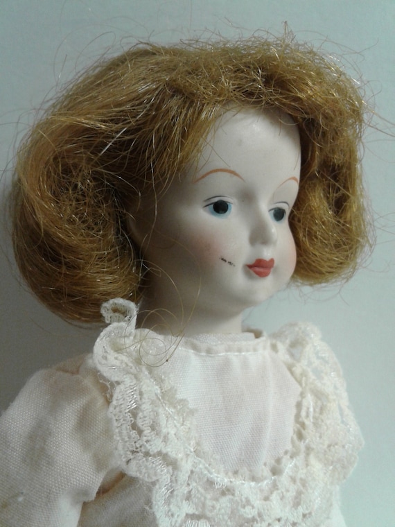 Antique Porcelain Bisque Doll Made in Japan Blue Eyes Soft Body
