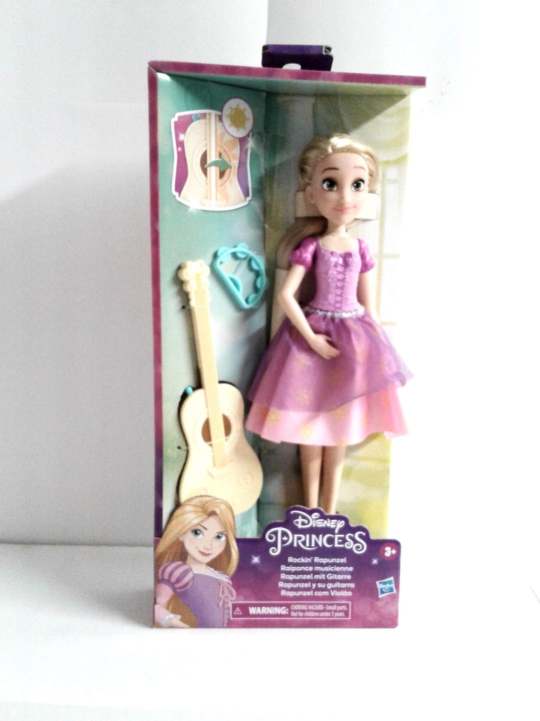 disney princess rapunzel doll with dress and accessories Disney Princess Rapunzel Fashion Doll with Blond Hair, Blue Eyes & Tiara Accessory