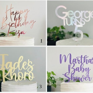 May include: Four cake toppers with different designs and colours. The first topper says "Happy 4th Birthday Eisa" in rose gold glitter. The second topper says "George Turns 5" in iridescent glitter. The third topper says "Jades Khoro" in gold glitter. The fourth topper says "Marthas Baby Shower" in purple glitter.