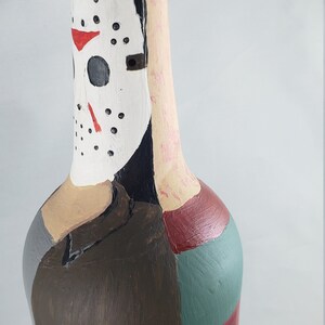 Horror movie characters Freddy vs Jason Two sided Decorative Bottle