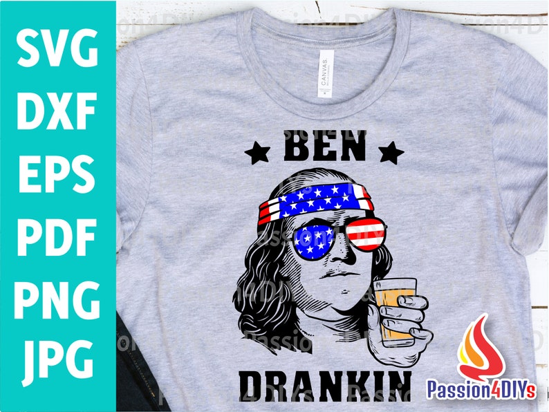 May include: A gray t-shirt with a black and white illustration of Ben Franklin wearing a red, white, and blue headband and sunglasses. The text "BEN DRINKIN'" is below the illustration.