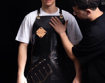 Black Embossed Leather Apron with Adjustable Leather Cross Back Straps and Pockets | Custom Apron, Barber Apron, Tattoo Artist Apron