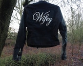 Hand painted leather jacket featuring the word 'Wifey'