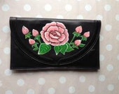 Hand-painted black leather clutch with pink rose and green leaf detail