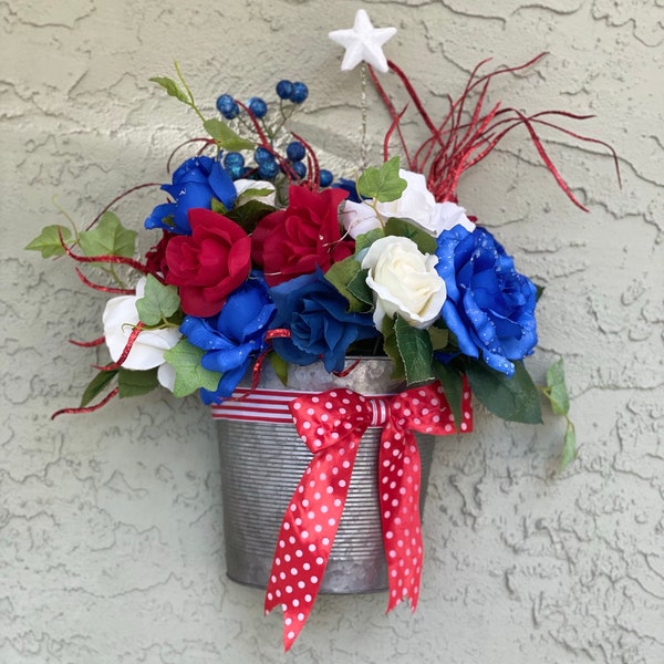 Patriotic lighted red, white and blue flower door or wall basket wreath