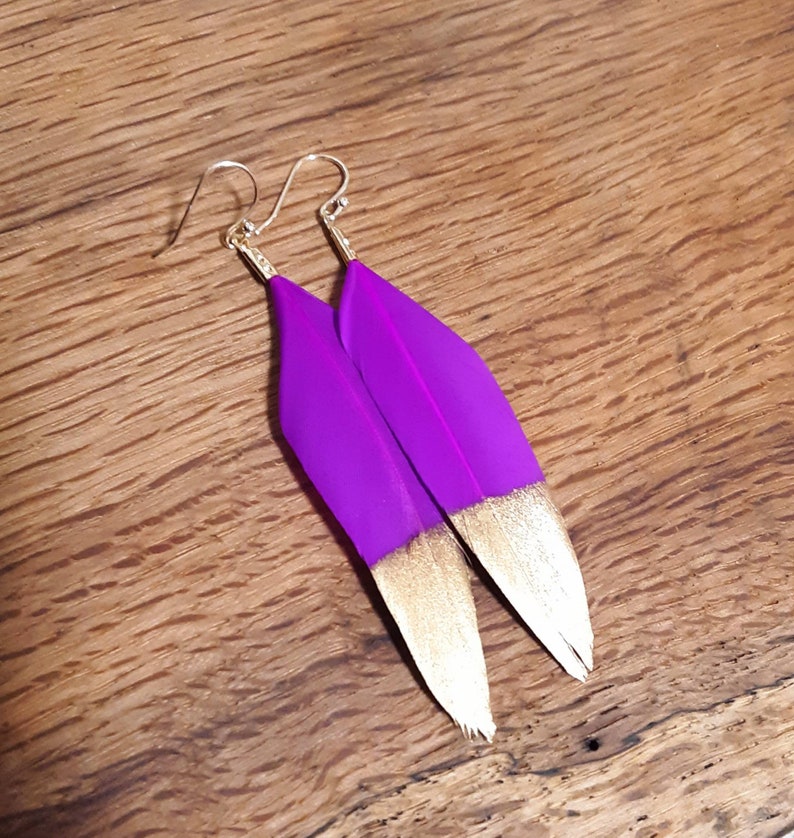 Gold dipped feather earrings Outlet