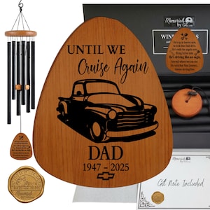 May include: A memorial wind chime set featuring a wooden teardrop-shaped plaque engraved with a vintage truck, the text UNTIL WE Cruise Again DAD 1947-2025, and a Chevrolet logo. Includes black metal tubes, a wooden striker, and a gift box.