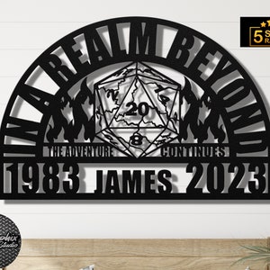 May include: Black metal sign with a 20-sided die in the center, surrounded by flames and the text "The Realm Beyond". The text "The Adventure Continues" is below the die. The years "1983" and "2023" are at the bottom of the sign.