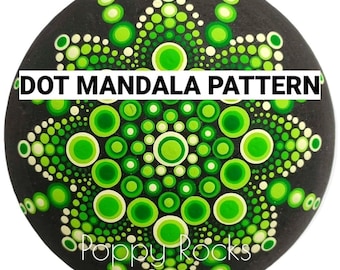 May include: A green and white dot mandala pattern painted on a round, black stone. The text "DOT MANDALA PATTERN" is written across the top of the stone.