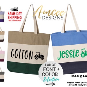 May include: Two personalized canvas tote bags with a tractor graphic. The bag on the left has a green, tan, and white striped design with the name "COLTON" in black text. The bag on the right has a blue, white, and navy striped design with the name "Jessie" in green text. Both bags have a tractor graphic in black and green. The text "LARGE FONT + COLOR Selection" is in a circle with an arrow pointing to the right.