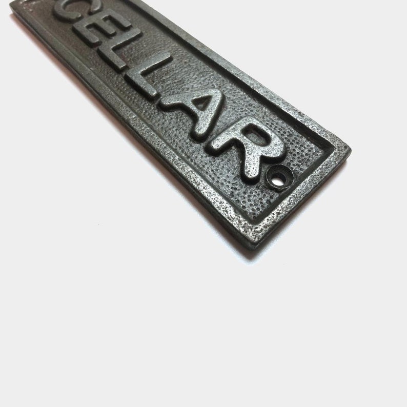 Cast Iron BATHROOM Sign 115mm x 35mm c/w fixing screws. Cast Iron BATHROOM Sign 115mm x 35mm c/w fixing screws.