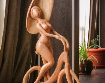 Wooden stylish hand carved sculpture "Lady on bicycle"