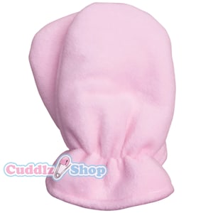 May include: A pair of pink fleece baby mittens with a gathered elastic cuff. The mittens are designed to keep baby's hands warm and prevent scratching.