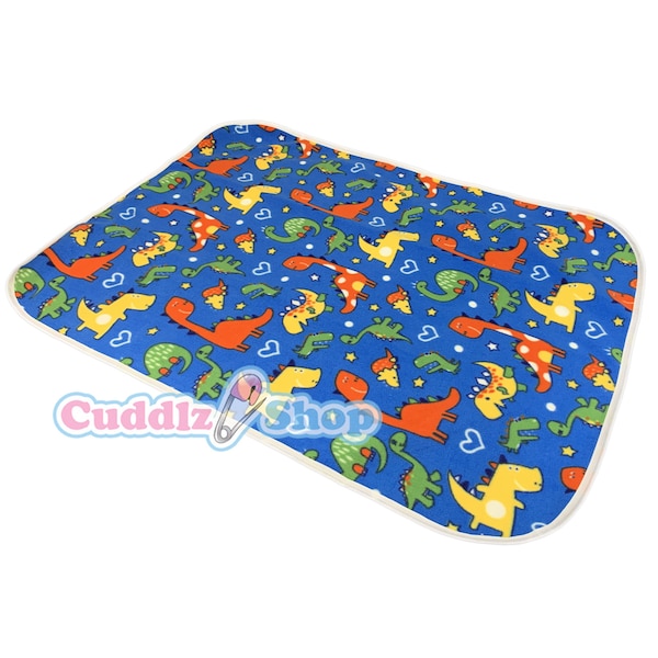 Molleton bleu à motif dinosaure Cuddlz et PVC blanc matelas à langer pour adulte, taille réversible, homme ou femme unisexe