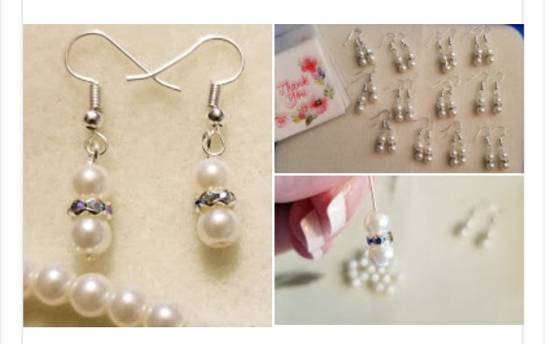 May include: A set of pearl and rhinestone earrings. The earrings are silver and have two white pearls on each earring. The pearls are separated by a rhinestone band.