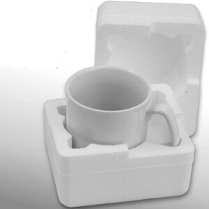 May include: A white ceramic mug with a handle, packaged in a white styrofoam box.