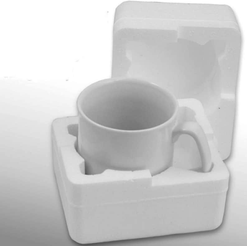 May include: A white ceramic mug with a handle, packaged in a white styrofoam box.