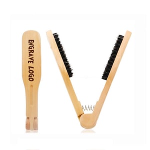 May include: A wooden brush with black bristles, featuring the text "ENGRAVE LOGO" on the handle. The brush is designed with a spring mechanism and a V-shape, ideal for cleaning. The natural wood color is prominent.
