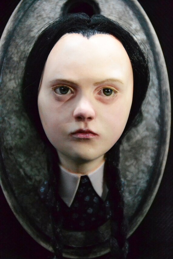 wednesday addams and her doll