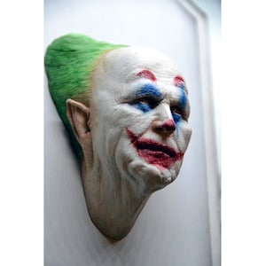 Francis Ford Coppola&#39;s &#39;&#39;Bram Stoker&#39;s Dracula&#39;&#39; Gary Oldman-sculptuur geschilderd als Joker.