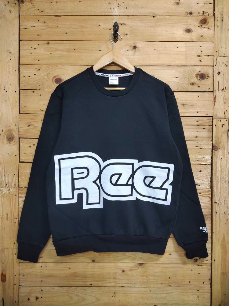 Reebok black shop sweatshirt