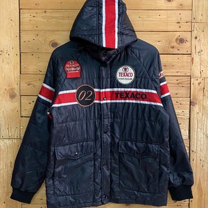 May include: Black hooded puffer jacket with red and white stripes, featuring a Texaco logo and the number "02" on the front.