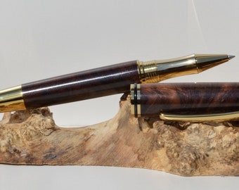 Hand turned rosewood pen with titanium fittings