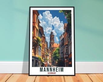 Könnte beinhalten: Gerahmter Kunstdruck von Mannheim, Deutschland, mit einer Straßenszene mit farbenfrohen Gebäuden und einem Kirchturm unter blauem Himmel mit Wolken. Der Druck hat den Stadtnamen und den Ländernamen unten.