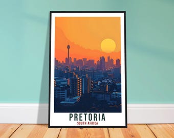 May include: A framed art print of Pretoria, South Africa, featuring a cityscape silhouette under a vibrant orange and yellow sunset. The print includes the city name and country in white text.