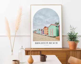 May include: A colorful print of beach houses with an arched frame and the text "Brighton Beach, Victoria".