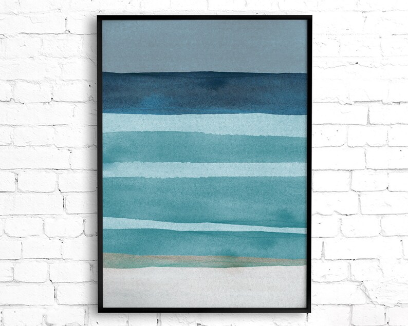 May include: Abstract watercolor painting in shades of blue and gray, depicting a seascape with horizontal stripes representing waves and a sandy beach at the bottom.