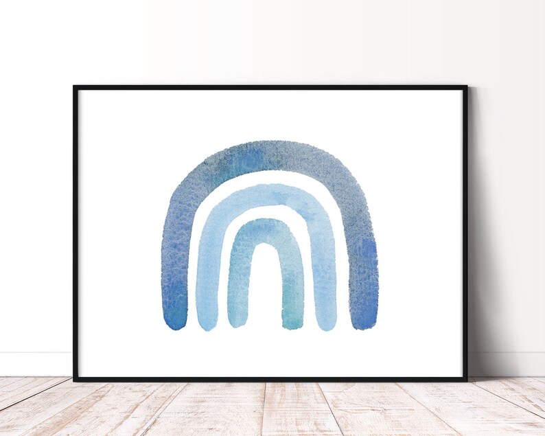 May include: A watercolor painting of a rainbow in shades of blue. The rainbow is painted in a simple, modern style, with a white background.