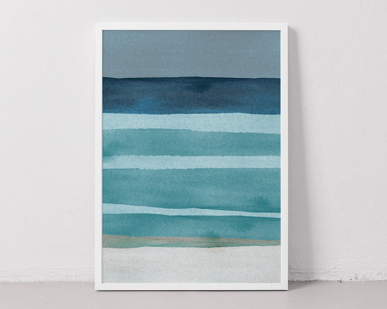 May include: Abstract watercolor painting of a seascape with blue and teal stripes representing waves and a light blue sky. The painting is framed in a white frame.