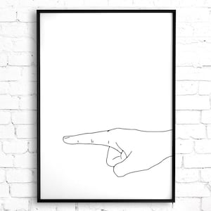 May include: Black framed art print featuring a minimalist line drawing of a hand pointing to the right. The artwork is set against a white background, with the hand's outline in black.