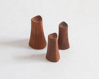 Salt, pepper and sugar shakers made of teak wood by Johnny Mattson, Sweden