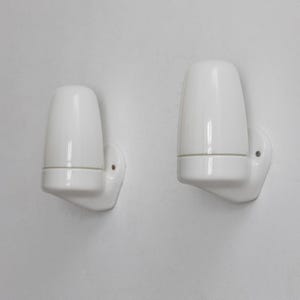 a pair (2) of Wilhelm Wagenfeld Bauhaus wall lamps, model 6077 for Lindner, Germany, 1950s