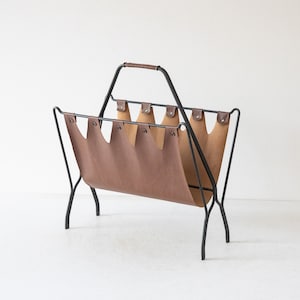 Hans-Agne Jakobsson magazine rack Mod. &#39;S-193&#39; made of iron and imitation leather, Sweden 1950s