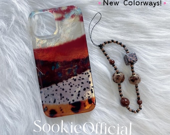Funda para iPhone con bloques de color nacarados, con cadena, MagSafe y opciones estándar, funda con degradado ámbar brillante.