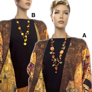 Cashmere Kimono of Klimt Art Print outfit with one of two Long artistic necklaces woven with large gemstones and leaves.