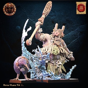 May include: A detailed miniature figure of a warrior with a mask, holding a staff, and a kiwi bird. The figure is surrounded by water-like structures. The text "Roroa Khans Vol 1." is at the bottom.