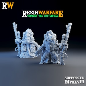 May include: Two 3D printed miniature figures of steampunk-style characters with intricate details and weapons. The figures are made of gray resin and are posed in a dynamic stance. The text "RESINWARFARE CONQUER THE BATTLEFIELD" is visible in the background.