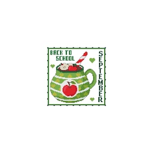 May include: Green mug with a red apple, red and white striped straw, and the text "Back to School" and "September".