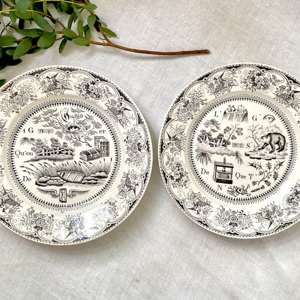 French GIEN Antique 19th Century Rebus Riddle Puzzle Plate Set Of 2 Black & White Cabinet Plates Made In France