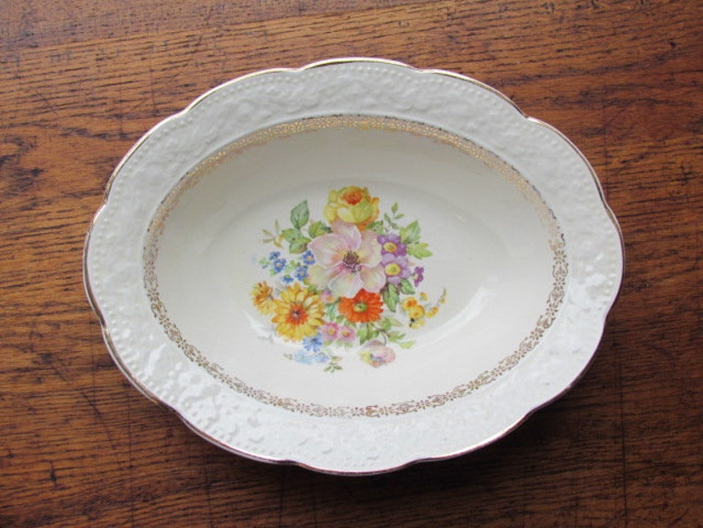 Knowles Flower Garden Vegetable Bowl Cream Color Floral Embossed Rim Gold Trim Oval Serving Bowl Edwin M