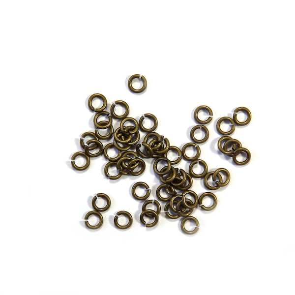Lot d'anneaux ouverts couleur bronze ou gun x 50