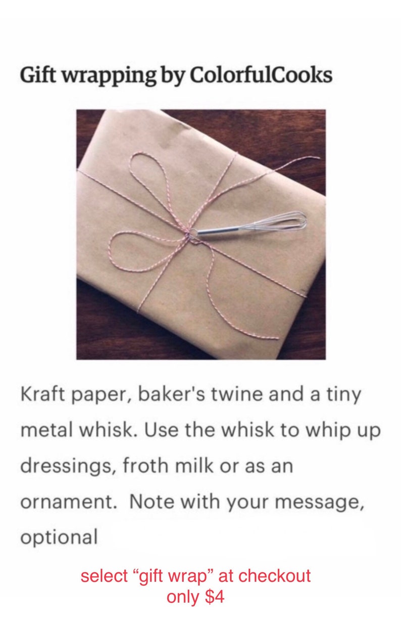 May include: A brown paper package tied with baker's twine and a small metal whisk. The package is tied with a bow and the whisk is placed on top of the bow. The text "select "gift wrap" at checkout only &pound;4" is visible at the bottom of the image.