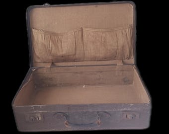 Stara brązowa, skórzana walizka vintage